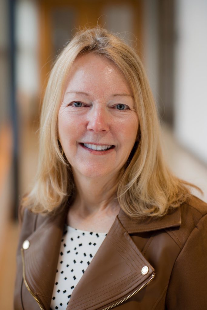 Headshot of Commissioner Beth Bookland.