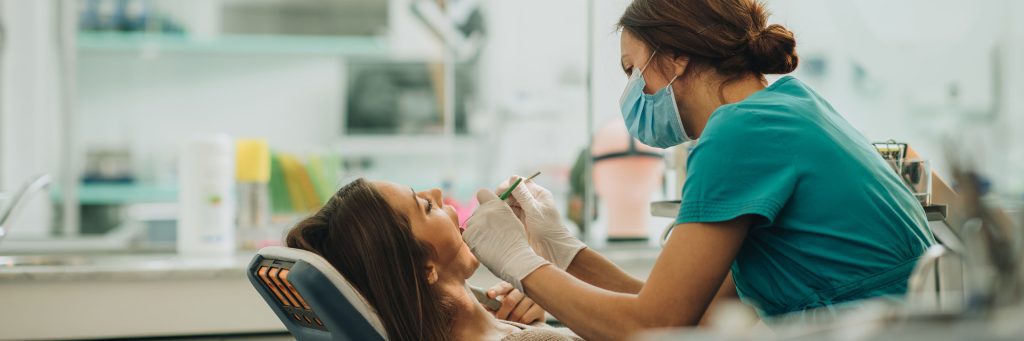 Dental patient with dentist doing amalgam work.