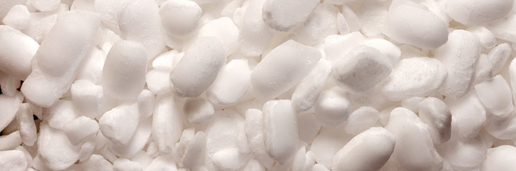 Close up of large water softener salt pellets for Salt Savers professionals resources.