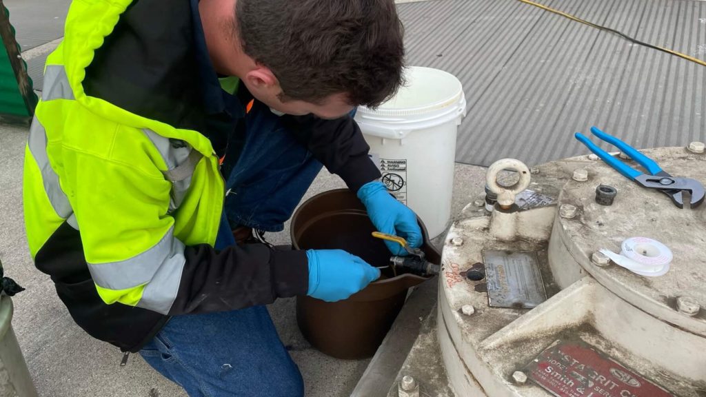 Changing the oil on the grit basin’s gearboxes and bull drive.