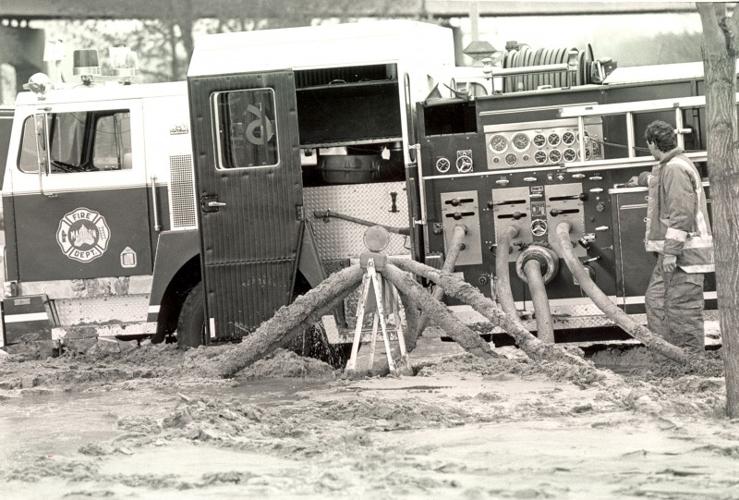 A Madison Fire Department pumper truck works while in several inches of melted butter. Credit: The Capital Times