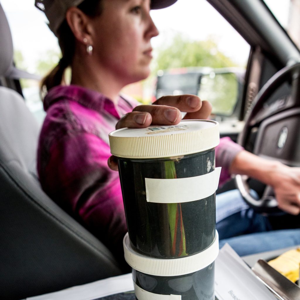 Testing biosolids for phosphorus availability was an early key piece in Metrogro’s phosphorus management. Watershed program coordinator Kim Meyer drives samples in a District vehicle.