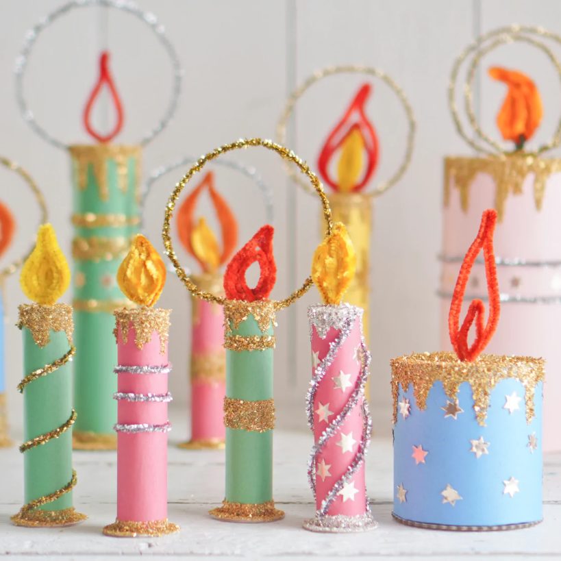 Retro-inspired candle craft made from paper-covered toilet paper rolls for Christmas, Hanukkah or Kwanzaa.