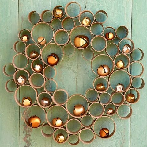 DIY wreath made of toilet paper rolls and jingle bells.