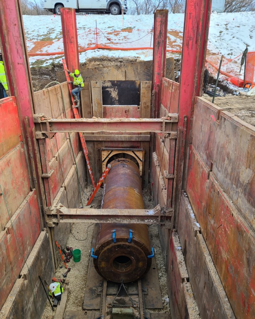 Phase 1 of the PS 17 Force Main Relief Project used pipe ramming to tunnel under County Highway M in 2021.