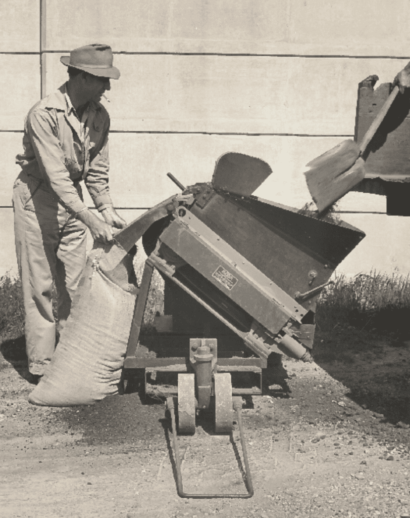 A District worker bags dried and ground sludge as "Nitrohumus", a fertilizer the District offered to the public.