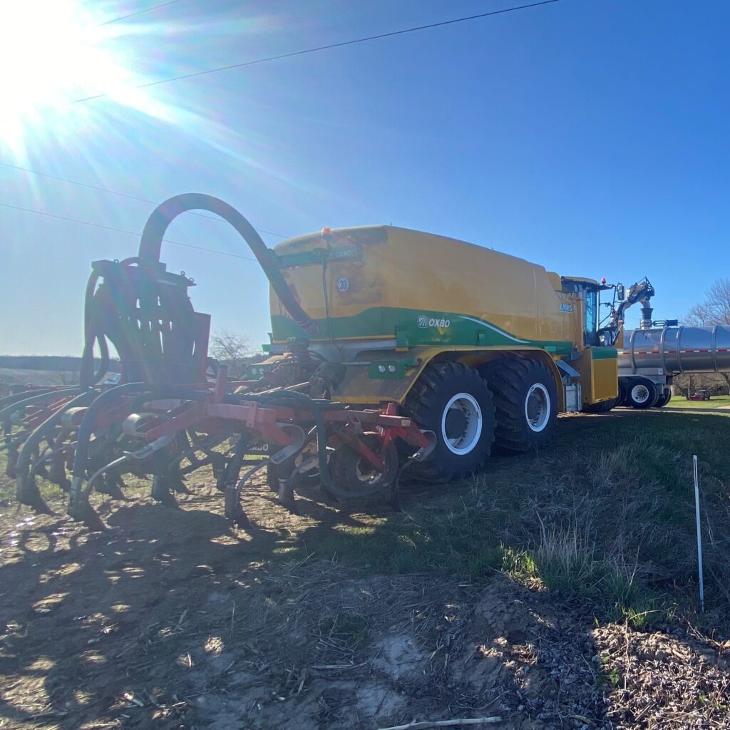 A sunny day for applying Metrogro in agricultural fields.