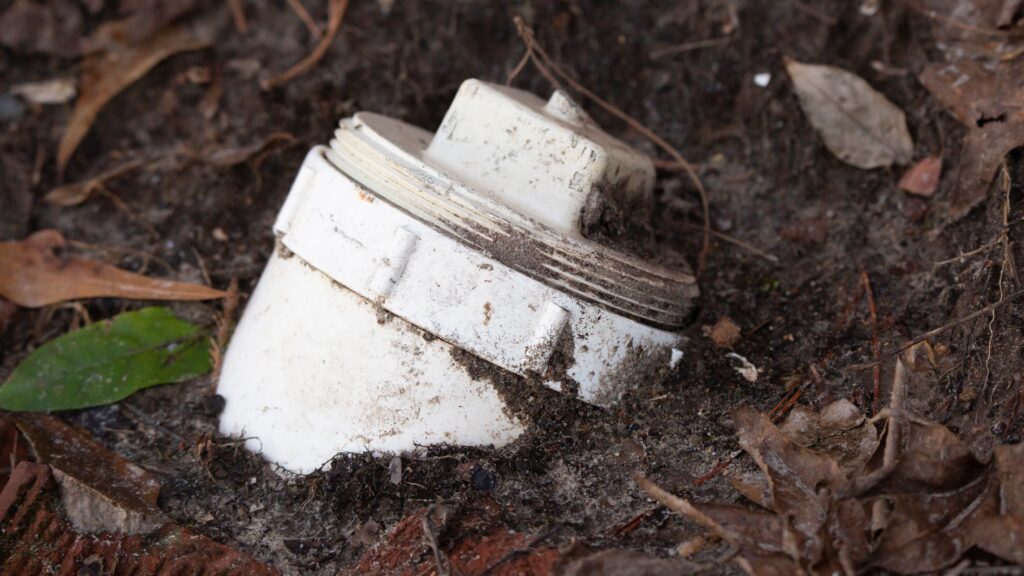 An example of a properly capped sewer lateral cleanout.