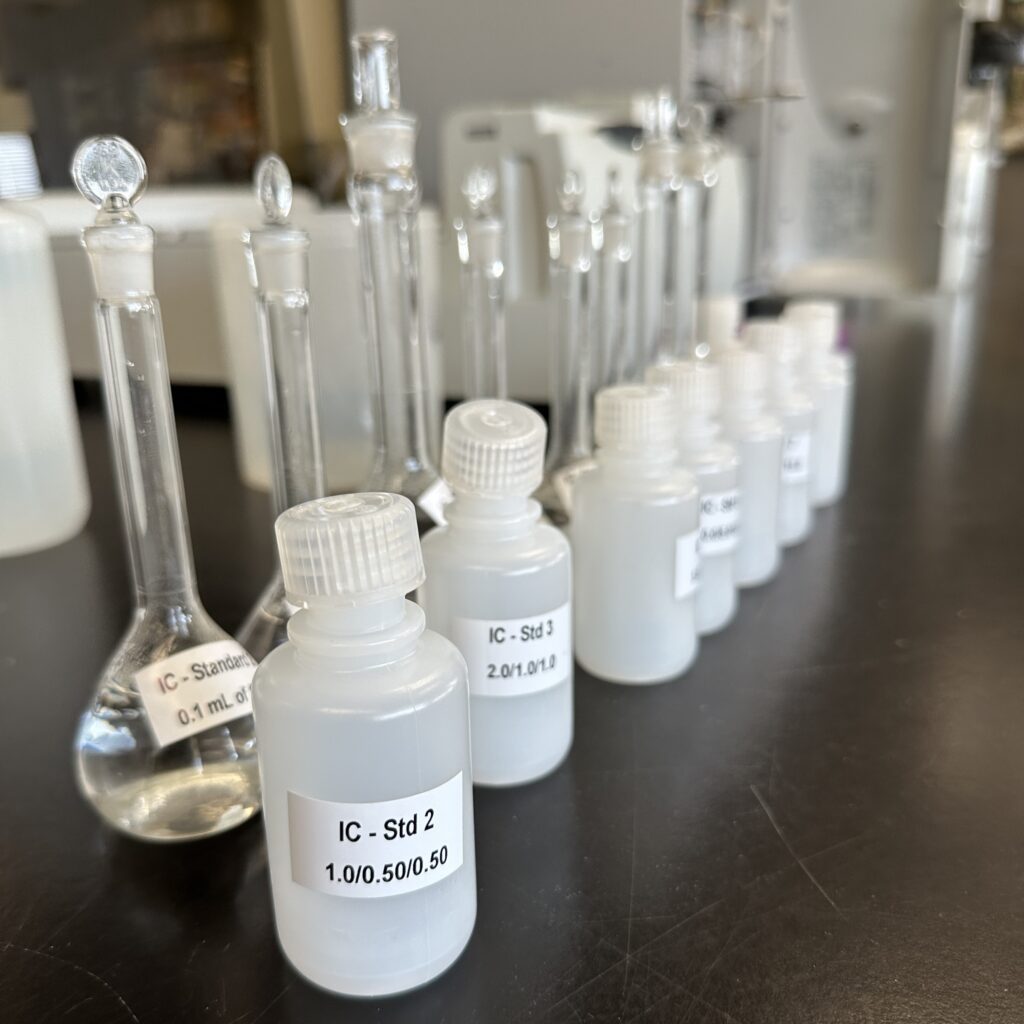 A role of vials and bottles ready for Ion Chromatography testing.
