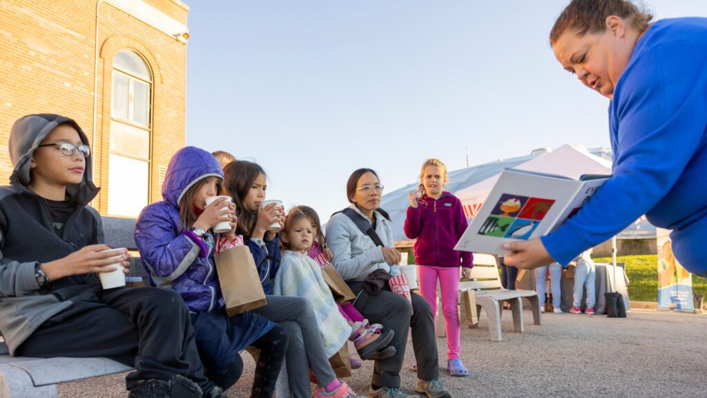 Families having fun taking a tour of the plant as part of the Clean Water Showcase event.