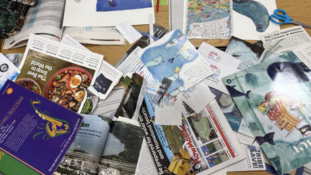 Collection of water-themed magazines being cut up to create collages, laid out on a table.