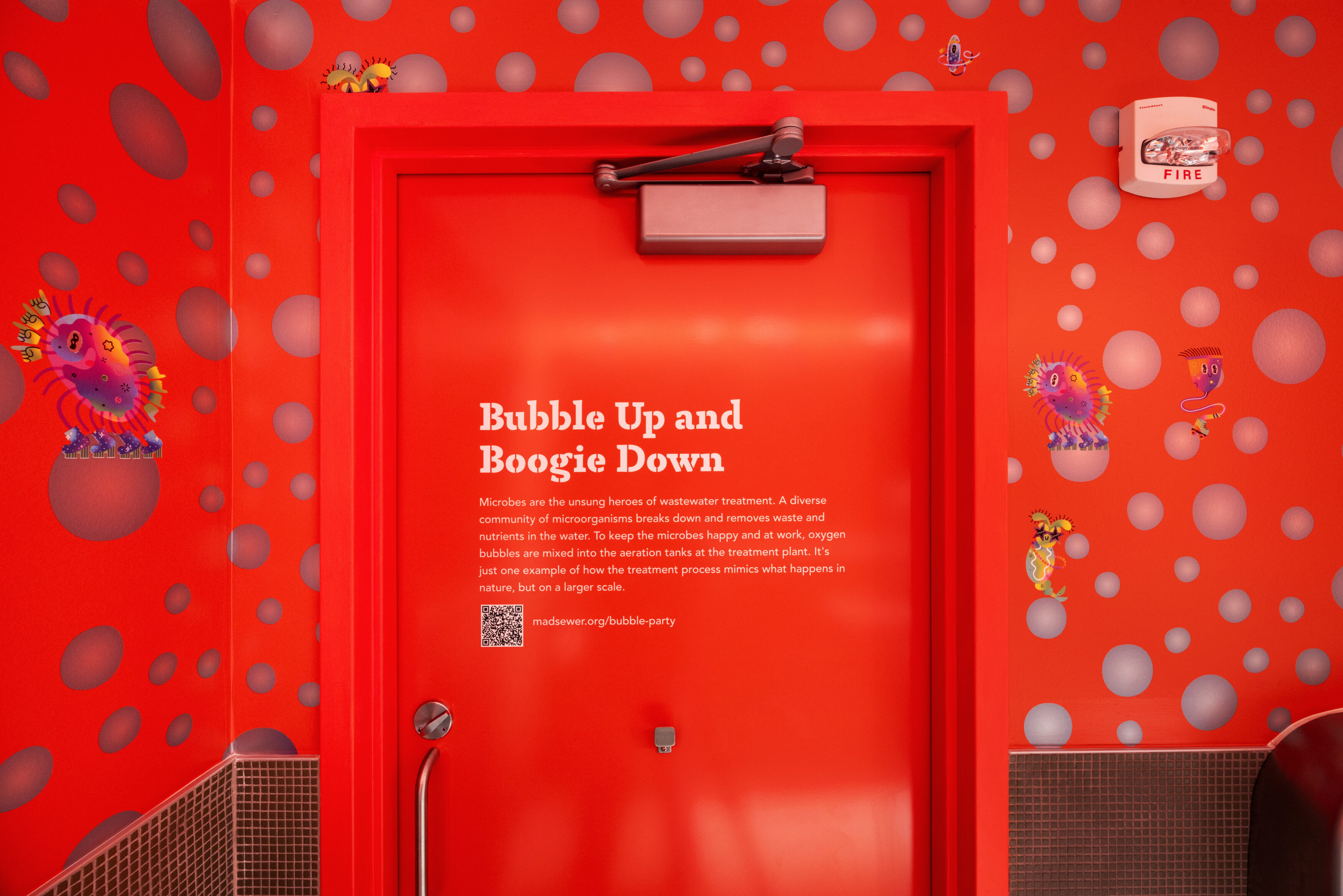 The Bubble Party bathroom at Madison Public Market features a door that says Bubble Up and Boogie Down and describes the secondary treatment process. The Bubble Party bathroom at Madison Public Market features a door that says Bubble Up and Boogie Down and describes the secondary treatment process.