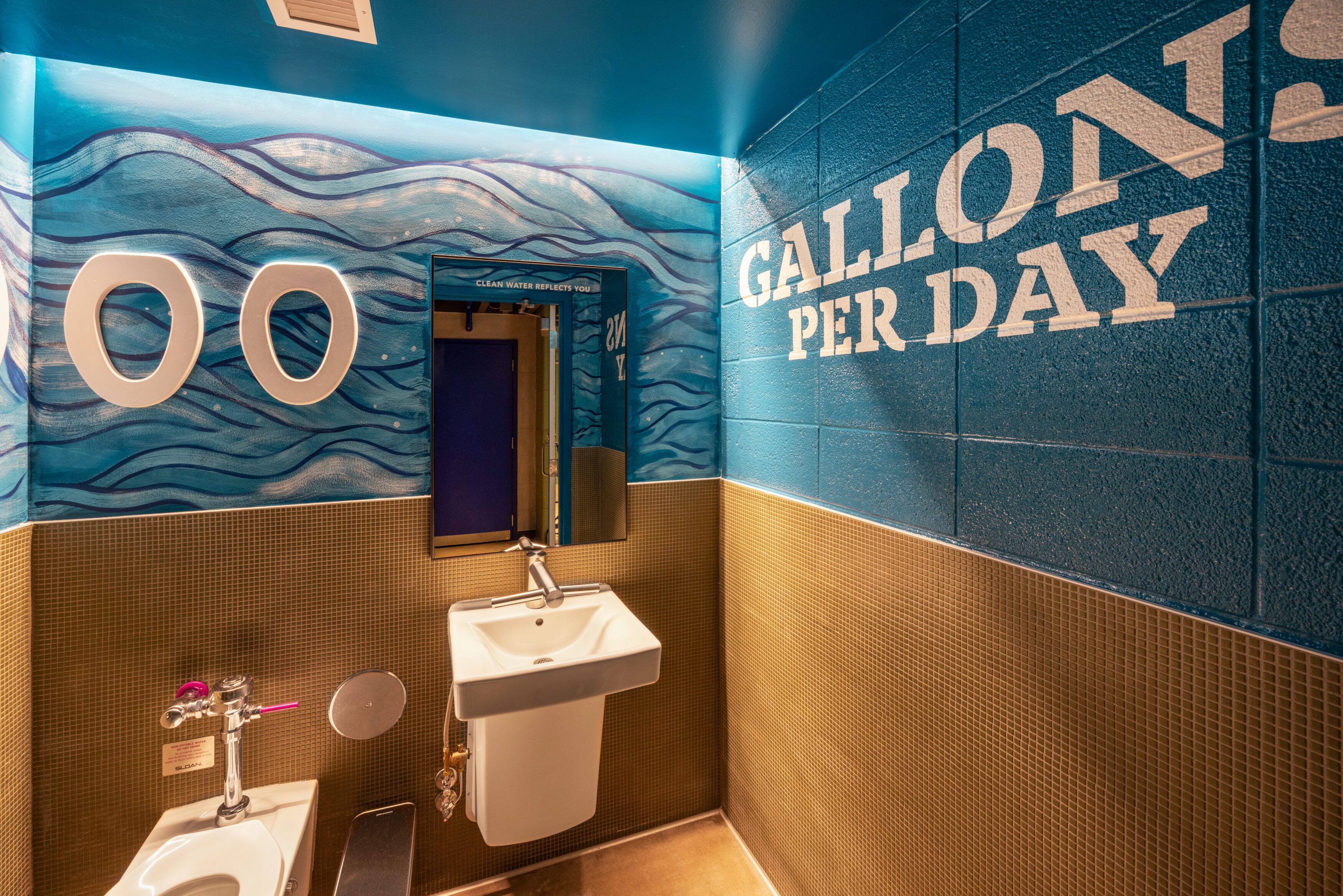 The "So Much Water" bathroom at the Madison Public Market communicates that the District receives about 40 million gallons of wastewater daily. The "So Much Water" bathroom at the Madison Public Market communicates that the District receives about 40 million gallons of wastewater daily.